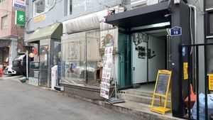 exterior of location - up the stairs (2nd floor) at Camouflage in Seoul