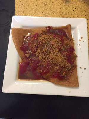 Apple crisp vegan crepe with raspberry and coconut caramel topping at Chez Elle in Kansas City