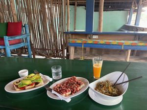 Tomato avocado toast, bruschetta, veg noodles  at Heart & Soul Cafè  in Zanzibar