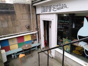 All promises written on window met inside at Ushi's Coffee Corner in Glasgow