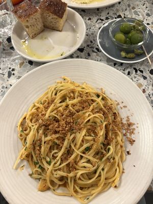Aglio e olio, focaccia, olives  at Pastaio in London
