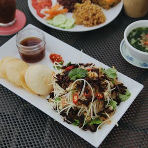 Vegan Papaya Salad, Vietnamese style, with mushroom jerky.  at The Joi Factory in Ho Chi Minh City