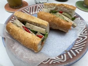 Banh mi cha muoi tieu on French baguette, part of the banh mi/iced tea combo for 78,000 VND (plus 10% tax)  at The Joi Factory in Ho Chi Minh City