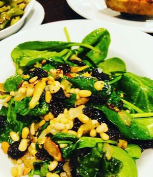 Baby spinach with raisins & pine nuts at Wavertree Town Hall in Liverpool