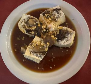 Spicy tofu with mushrooms.   at Chí Cà in Montecatini Terme
