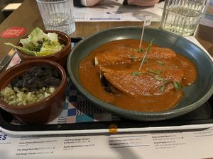 Vegan ancho mushroom enchiladas  at Wahaca - Wimbledon in South West London