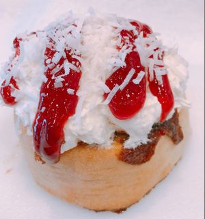 Coconut Frosting with Shredded Coconut & Strawberry Jam! at Cinnaholic in Ann Arbor