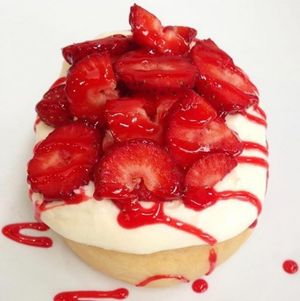 Cream Cheese Frosting topped with Fresh Strawberries and Strawberry Jam!  at Cinnaholic in Ann Arbor
