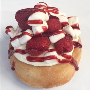 Marshmallow Frosting, Fresh Raspberries, Mini Marshmallows & Strawberry Jam! at Cinnaholic in Ann Arbor