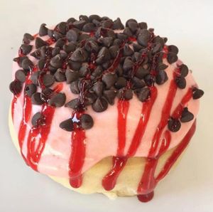 Strawberry Frosting with Chocolate Chips & Strawberry Jam! at Cinnaholic in Ann Arbor