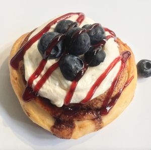 Vanilla Frosting, Fresh Blueberries & Strawberry Jam! at Cinnaholic in Ann Arbor