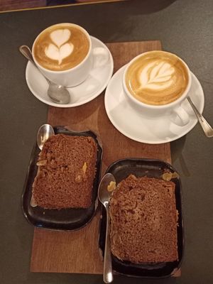 Almond cake, flat white, cappuccino at BELGA & CO in Brussels