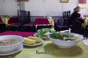 Some plates and the tables at Bo De Quan - Ho Tung Mau in Vinh