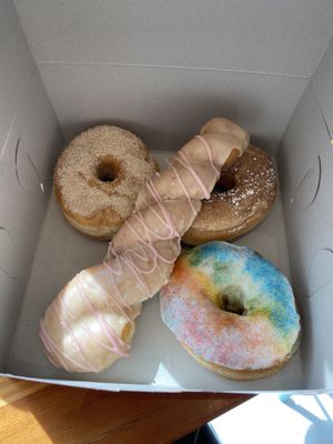 Cinnamon sugar, pb&j twist, french toast, and pride donut  at Dough Joy - East Pike Street in Seattle