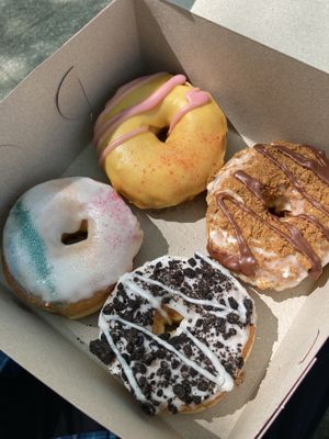 (Clockwise order, starting top left) Strawberry lemonade, Vanilla Biscoff, Cookies&Cream, Pride at Dough Joy - East Pike Street in Seattle