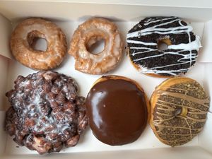 Glazed Old Fashioned x2 , Cookies & Cream, Bavarian Cream, Chocolate Biscoff, Blueberry fritter (clockwise from top left) at Dough Joy - East Pike Street in Seattle