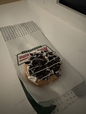 vegan cookies and crème donut  at Krispy Kreme in Watford