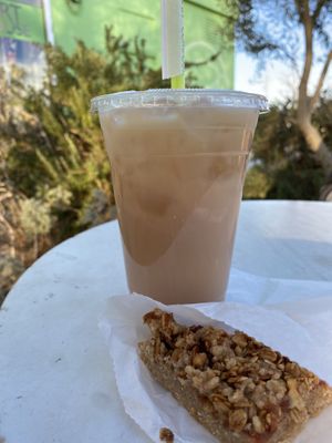 Milk rose tea with oat milk and vegan peach crumble bar at Sagebrush Cafe in Quartz Hill