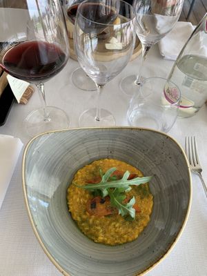 Riso Carnaroli della Riserva San Massimo mantecato alla carota, pesto di erbe e rucola selvatica  at Polisena L'Altro Agriturismo in Pontida