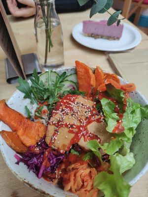 Bibimbap bowl and cheesecake at Star Anise Arts Cafe in Stroud