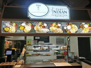 Stall front and menu at MINT@31 in Central Singapore