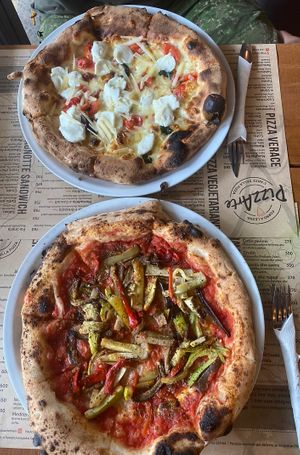 Capers on top and Vegetarian without cheese on the bottom   at Pizzarte in Tirana
