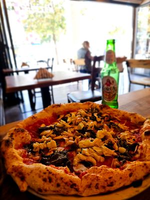 Vegan pizza with mushrooms, artichoke and friarielli. at Pizzarte in Tirana