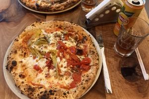 Pizza vegetaria and ice tea at Pizzarte in Tirana