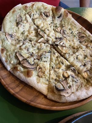 Pizza funghi  at Earthly Kitchen in San Jose
