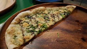 Feta balsamico pizza (vegan) at Earthly Kitchen in San Jose