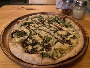 Is that my face? Is that Pizza? It's both!  at Earthly Kitchen in San Jose