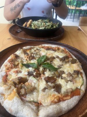 Soft doughy pizza & undercooked old pasta. Yum   at Earthly Kitchen in San Jose