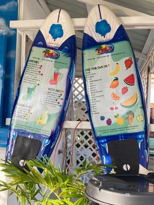 Juice / shake menu with vegan options - all items marked as vegan/vegetarian/contains nuts  at Mauchi Smoothies in Savaneta