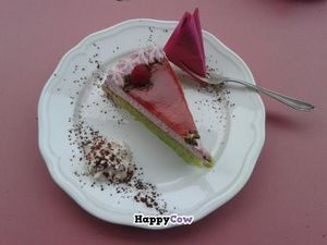 Raspberry and pistachio cake. (The sponge itself is pistachio flavour, amazing!) at Ohlala in Berlin