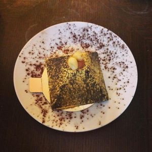chocolate pyramid filled with peanut butter mousse  at Ohlala in Berlin