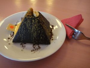 Vegan chocolate dessert with nougat and peanut butter centre. Tastes a little like a Snickers bar. Rich and one to share! at Ohlala in Berlin