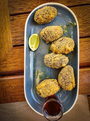 croquete de feijoada, acompanha melaço at Casa Patuá in Fortaleza