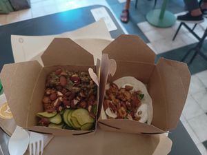 Delicious taco on the right. On the left a salad. at PLANTE Lab in Catania