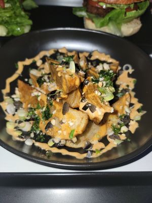 Peruvian fries with vegan chili scallion sauce at Seawiches Lounge Bar in Roatan