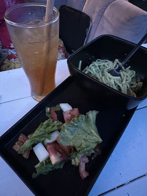 “Creamy” pasta, salad, and kombucha  at Seawiches Lounge Bar in Roatan