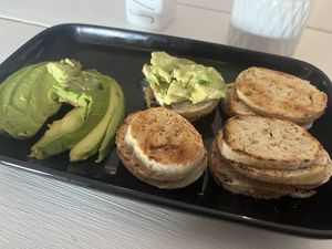 Avocado on mini toasts  at Seawiches Lounge Bar in Roatan