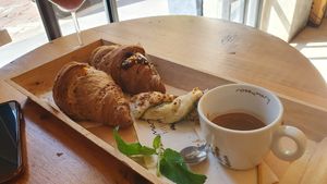 Vegan croissants, one cream and one chocolate, and a pistachio pastry twist at Rosebymary in Milan