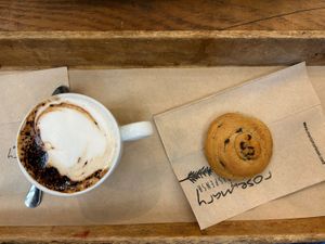 oat cappuccino and banana and chocolate cookie  at Rosebymary in Milan