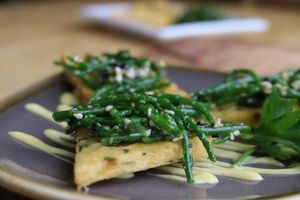 International Salon Culinaire Live competition, silver medal winning dish, yellow pea Panelle with samphire in gomaae.  at River Green Restaurant in Norwich