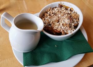 Apple, date, cinnamon and ginger crumble at River Green Restaurant in Norwich