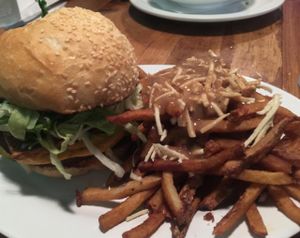 bacon cheeseburger with poutine at The Hogtown Vegan in Toronto