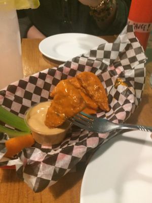 Chicken wings with buffalo sauce at The Hogtown Vegan in Toronto