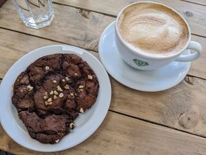 GF chocolate cookie and oat milk latte at Vemillion in Basingstoke