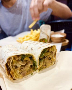 Mushroom Fajita: homemade dough, fajita mix with onions, pepper, mushrooms, lettuce, pickles, vegan mayo at Future Diner in Yerevan
