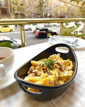 Loaded fries topped with special minced soy chunks, vegan cheddar cheese and mayo sauce at Future Diner in Yerevan